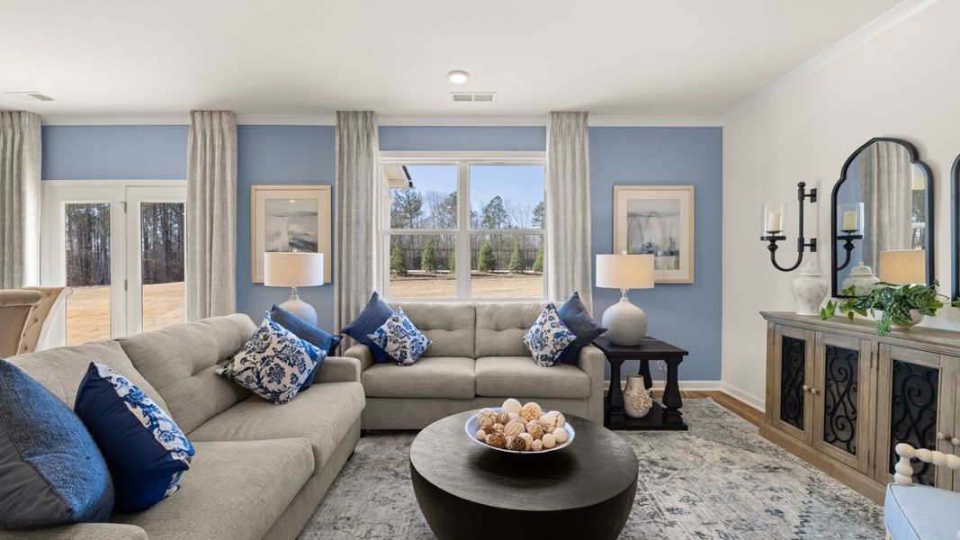 Representative furnished interior of a home built from the Hayden by D.R. Horton in Champion's Run, Lithonia (Image 7).