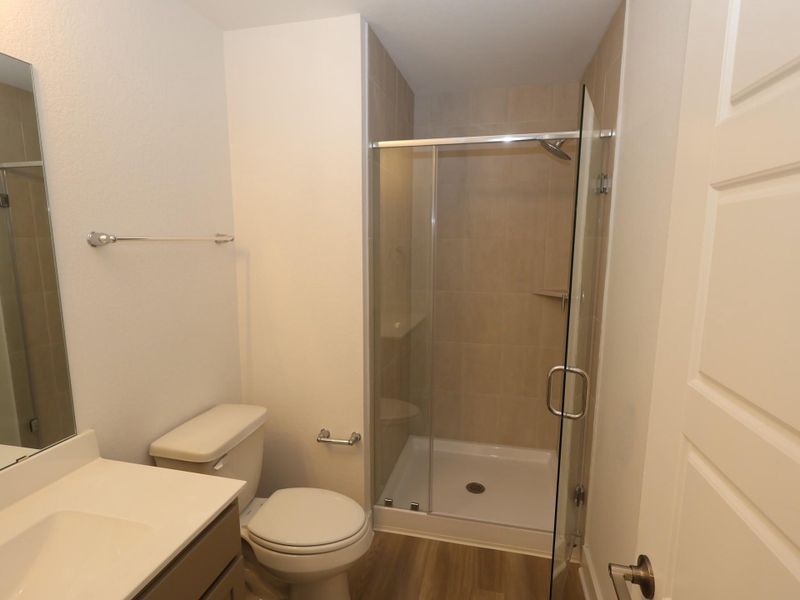 Furnished interior view inside a new home in Lone Star Landing, Montgomery (Image 13).