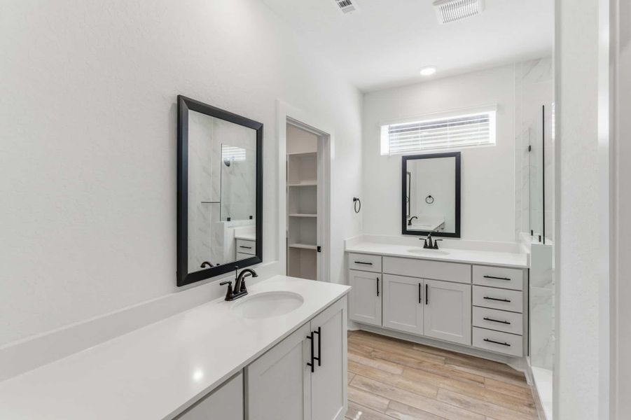 Furnished interior view inside a new home in Centero at Stone Oak, San Antonio (Image 6).