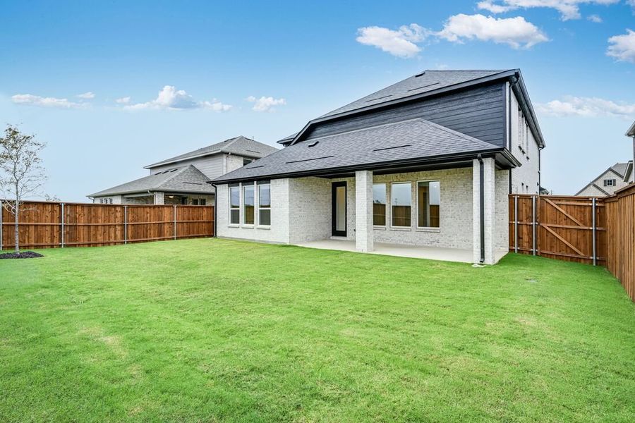 Exterior details and patio area of a home in Cross Creek Meadows 55s, Celina (Image 3).