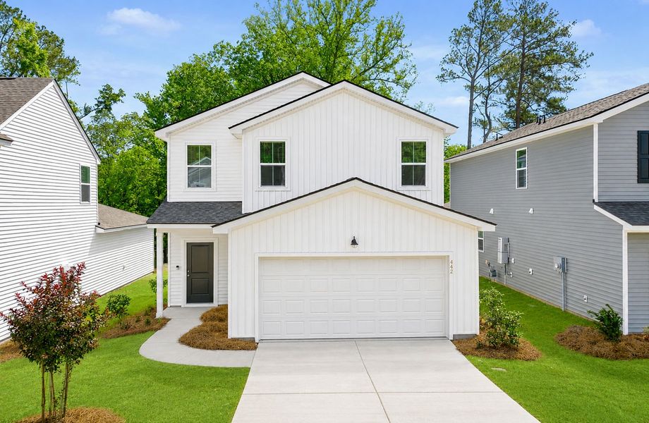 Front exterior of a new home in Grand Arbor, Blythewood, SC, highlighting curb appeal (Image 18). Front exterior of a new home in Grand Arbor, Blythewood, SC, highlighting curb appeal (Image 18).