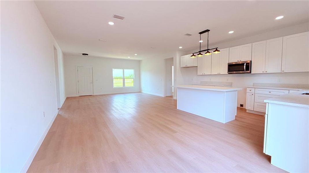 Spacious, unfurnished interior of a new home in , Lake Placid (Image 9).