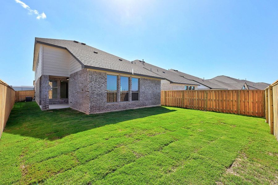 Exterior details and patio area of a home in Parmer Ranch, Georgetown (Image 24). Exterior details and patio area of a home in Parmer Ranch, Georgetown (Image 24).