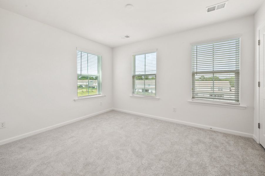 Spacious, unfurnished interior of a new home in Clear Springs Townhomes, North Charleston (Image 27).