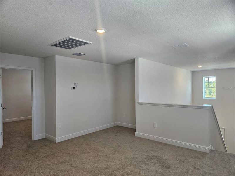 Spacious, unfurnished interior of a new home in The Reserve at Hammock Oaks - Classic Series, Lady Lake (Image 35).