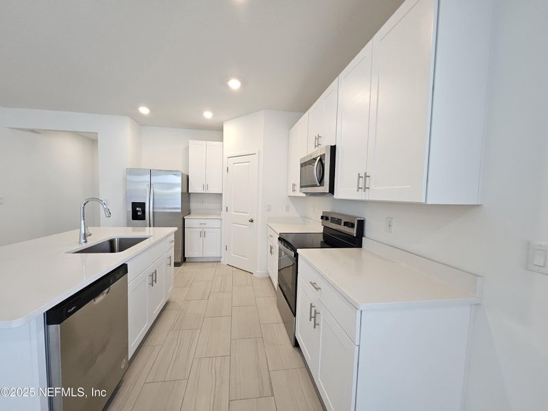 Furnished interior view inside a new home in Lakes at Bella Lago - Signature Series, Green Cove Springs (Image 11).