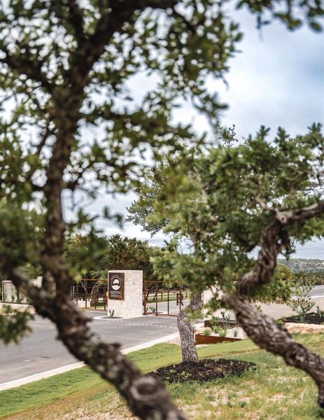 Front exterior of a new home in , Dripping Springs, TX, highlighting curb appeal (Image 2). Front exterior of a new home in , Dripping Springs, TX, highlighting curb appeal (Image 2).