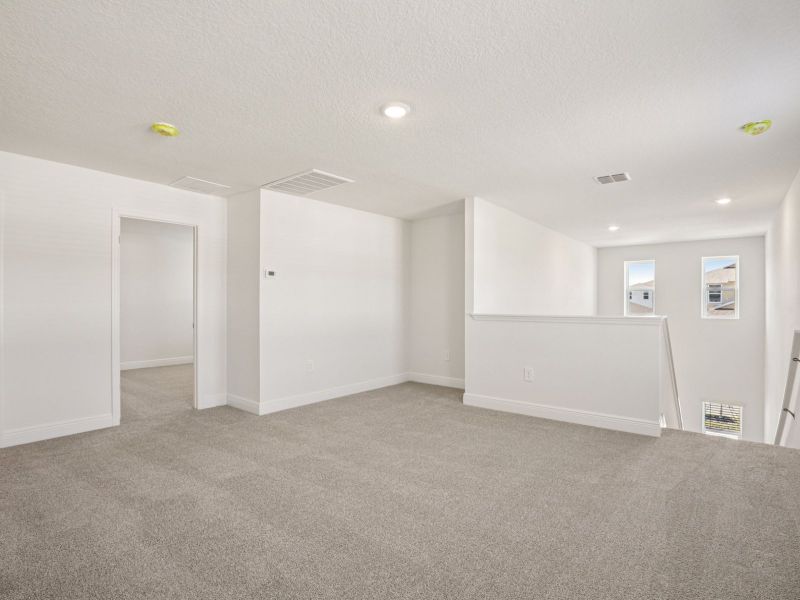 Spacious, unfurnished interior of a new home in Hamilton Bluff - Classic Series, Haines City (Image 8).