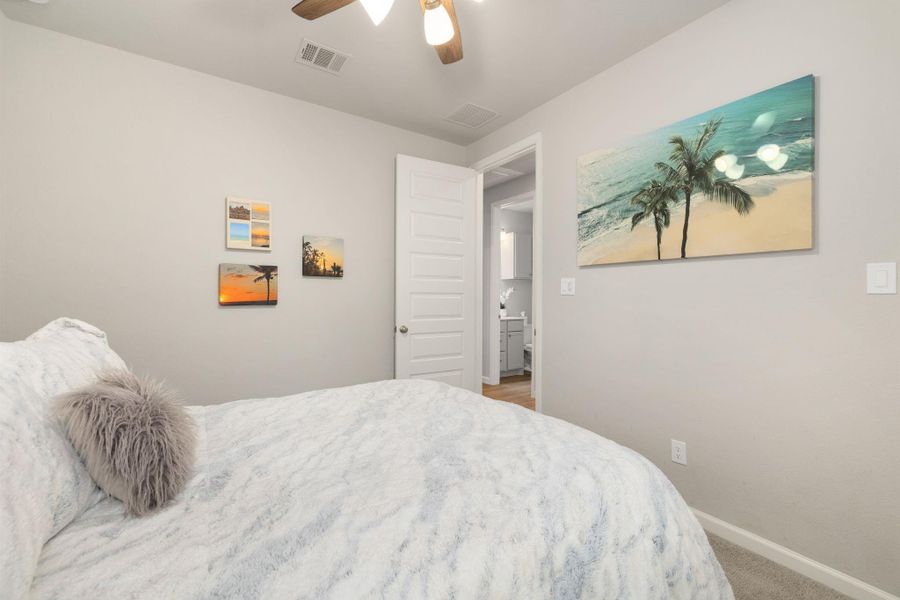 Furnished interior view inside a new home in Meridiana, Manvel (Image 18).