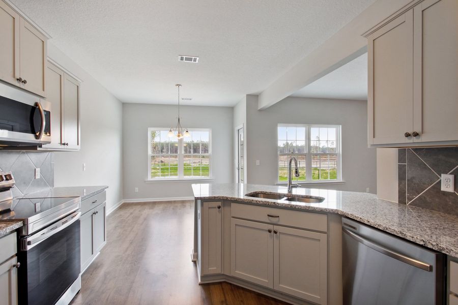 Representative furnished interior of a home built from the The Marne With Bonus by RTS Homes in Grand Reserve, Hinesville (Image 10).