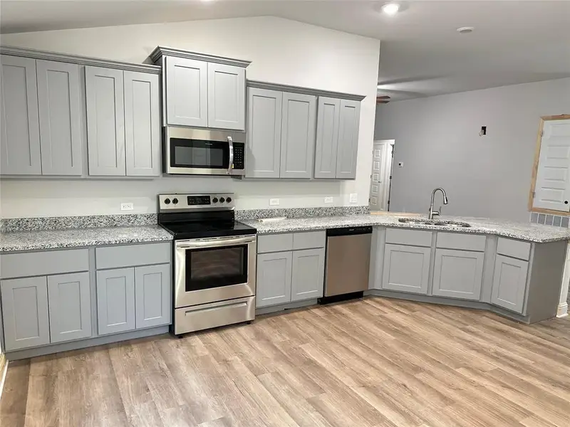 Furnished interior view inside a new home in Kiber Reserve, Angleton (Image 5).