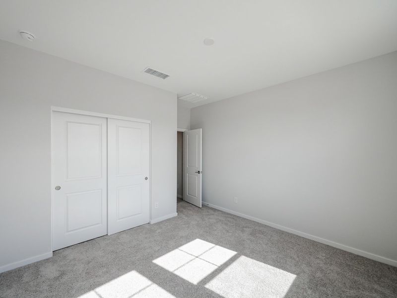 A room with white doors.