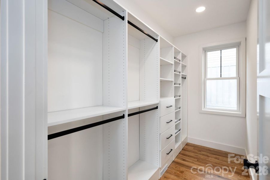 Walk-In Closet with Custom Built-In Organization