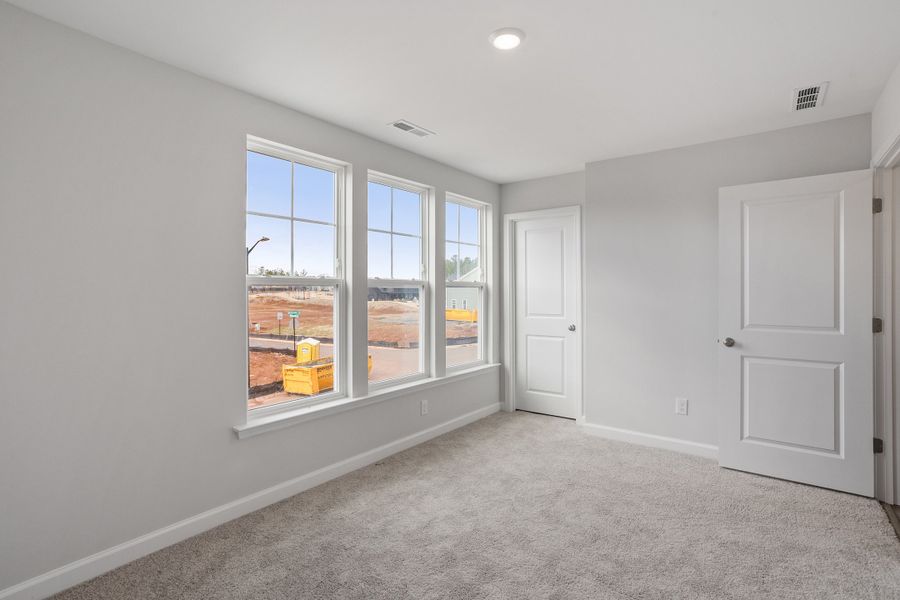 Spacious, unfurnished interior of a new home in Sweetbrier, Durham (Image 32).