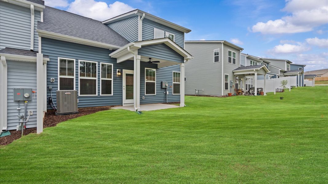 Front exterior of a new home in Aspen Ridge, Lyman, SC, highlighting curb appeal (Image 2). Front exterior of a new home in Aspen Ridge, Lyman, SC, highlighting curb appeal (Image 2).
