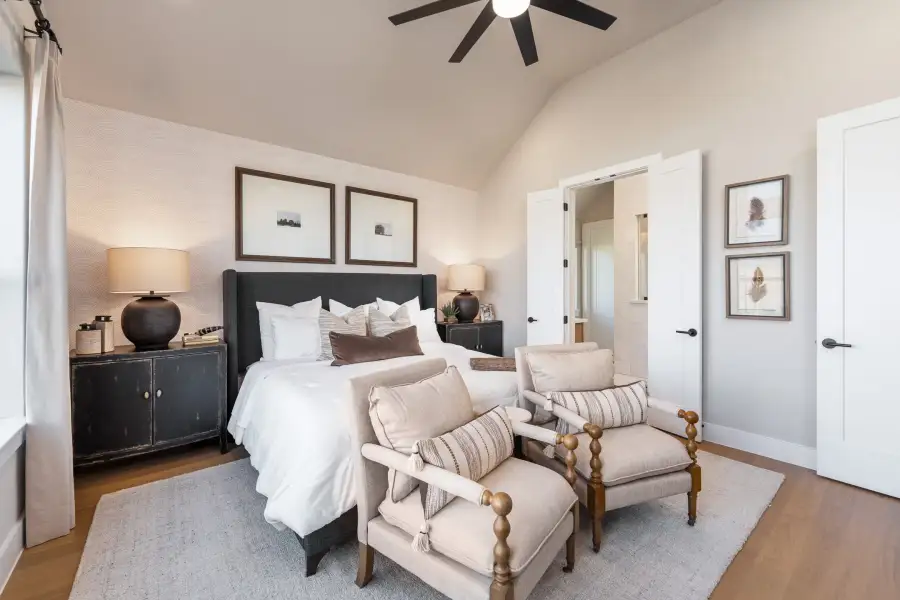 Furnished interior view inside a new home in Ellwood, Iowa Colony (Image 7).