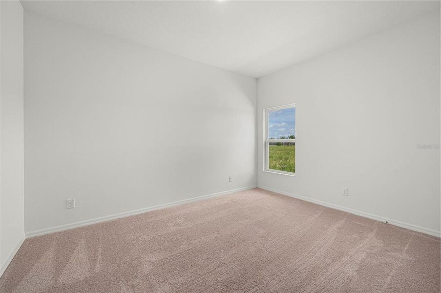 Spacious, unfurnished interior of a new home in Gum Lake Preserve, Lake Alfred (Image 12).