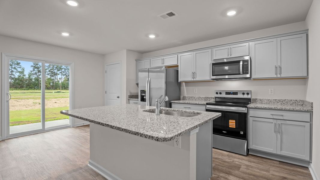 Furnished interior view inside a new home in Hobbs Farm, Ayden (Image 6).