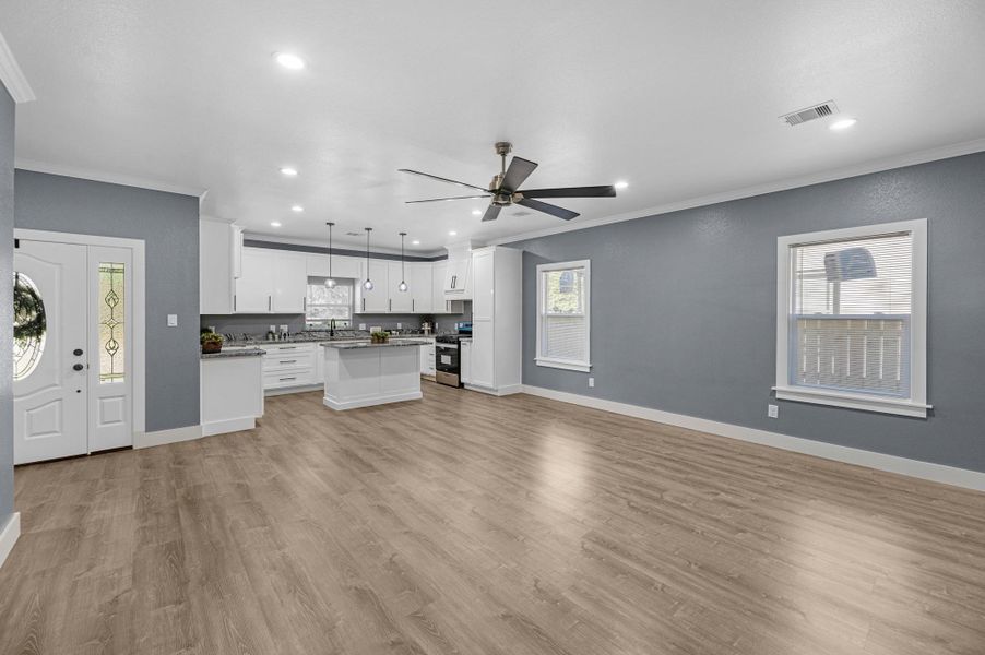 As you enter, you are greeted with an open floor plan. 9 foot ceilings make this home extra spacious!