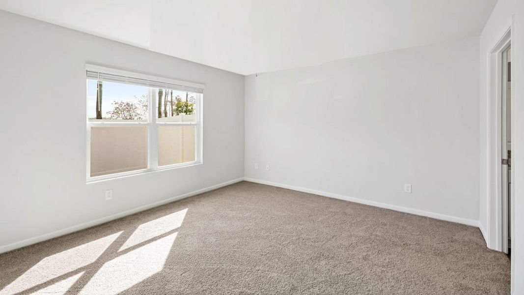 Representative unfurnished interior of a home built from the BAYSHORE by D.R. Horton in Indigo Preserve Townhomes, Leland (Image 21).
