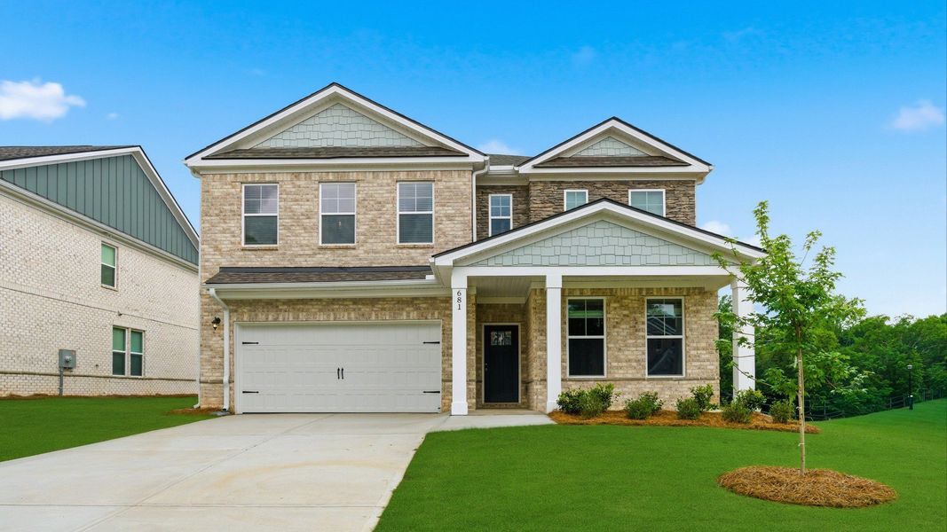 Representative exterior photo of a completed home built from the Wynwood by DRB Homes in Bowers Farm, McDonough, GA (Image 22).