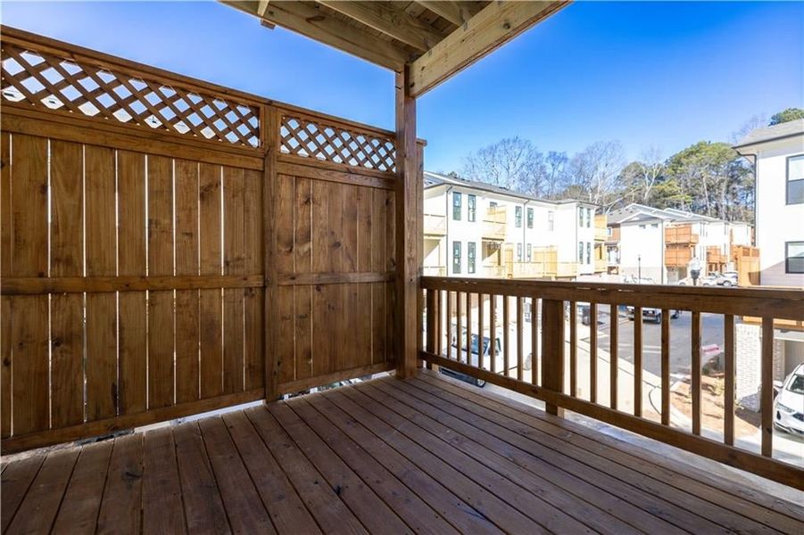 From the sunroom, you can step outside to the covered deck for a breath of fresh air.
