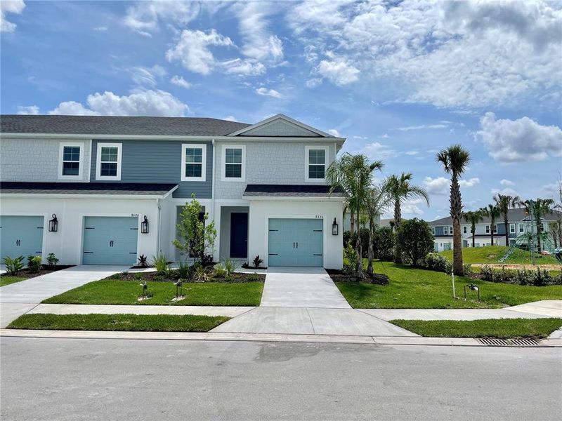 Front exterior of a new home in , Parrish, FL, highlighting curb appeal (Image 2). Front exterior of a new home in , Parrish, FL, highlighting curb appeal (Image 2).