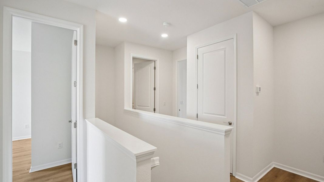 Furnished interior view inside a new home in Isla Mirada, San Antonio (Image 15).
