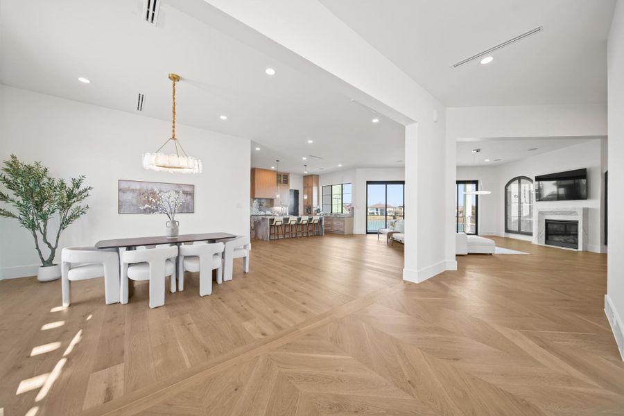 Upon arrival on the second floor, you are immediately greeted by the open concept dining, living, and kitchen space.