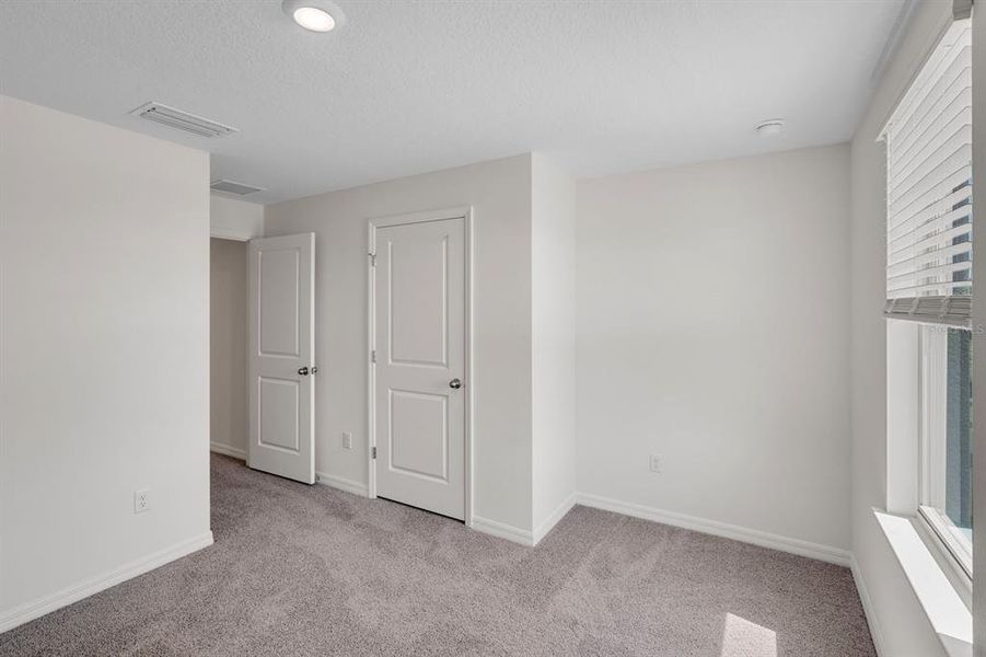 Spacious, unfurnished interior of a new home in Waterleigh, Winter Garden (Image 36).