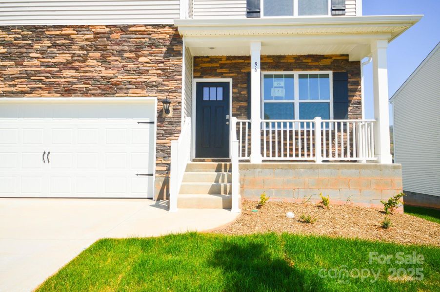 Front exterior of a new home in Valleywood Farms, Waynesville, NC, highlighting curb appeal (Image 2). Front exterior of a new home in Valleywood Farms, Waynesville, NC, highlighting curb appeal (Image 2).