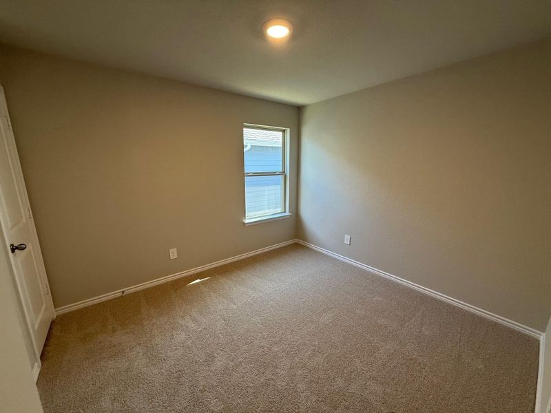 Spacious, unfurnished interior of a new home in Southern Pointe, College Station (Image 7).