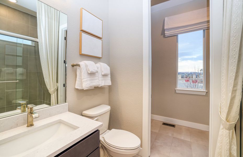 Furnished interior view inside a new home in Sterling Ranch, Littleton (Image 22).