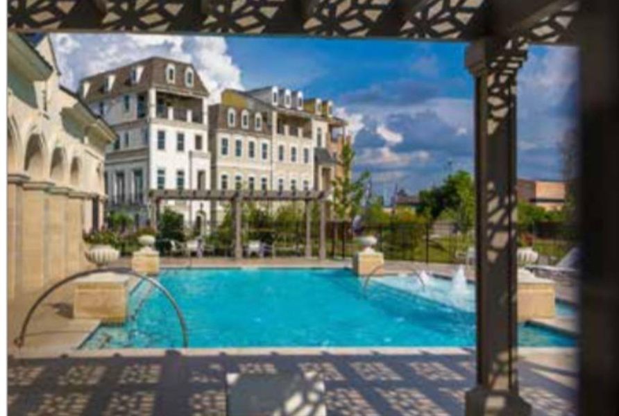 The beautiful pool overlooks the communities lake and fountain.