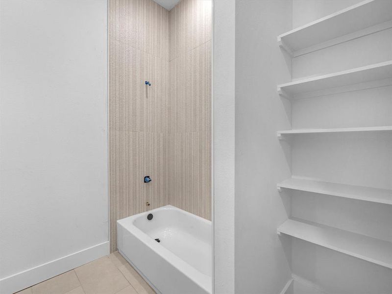 Hall Bath with double vanity and black fixtures