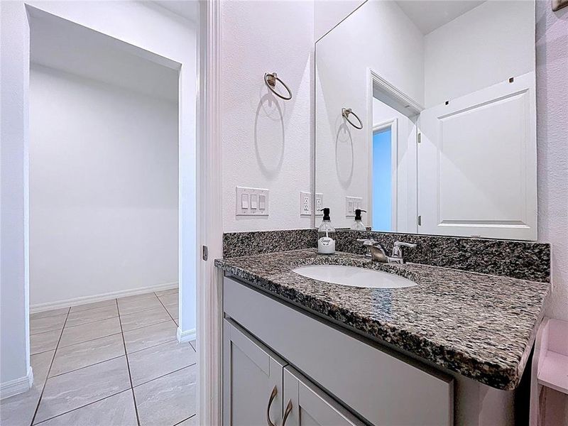 Furnished interior view inside a new home in Covered Bridge at Liberty Bluff, Haines City (Image 43).