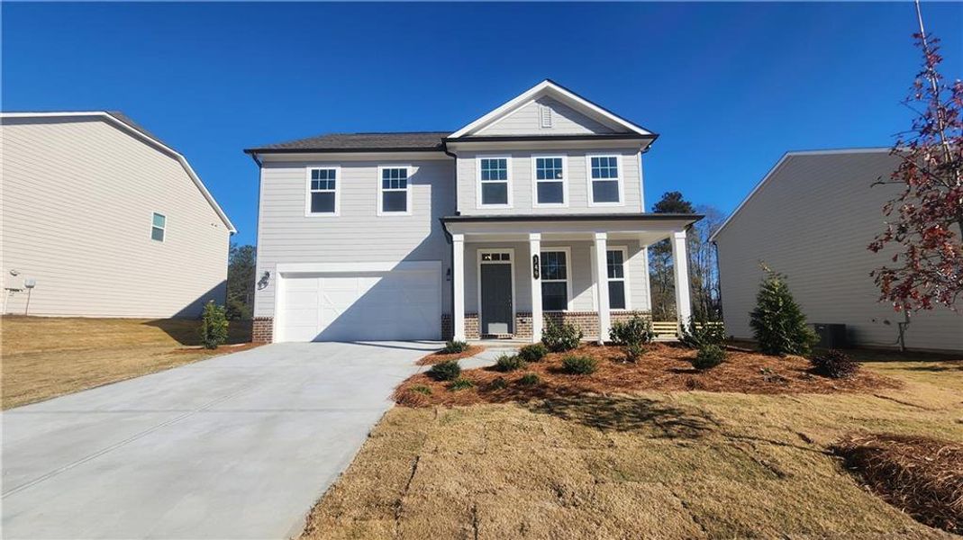 Front exterior of a new home in The Estates at Casteel, Bethlehem, GA, highlighting curb appeal (Image 17).