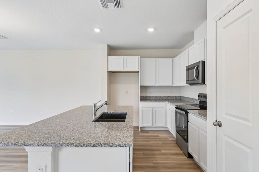 Furnished interior view inside a new home in Reserve at Forest Lake Townhomes, Lake Wales (Image 6). Furnished interior view inside a new home in Reserve at Forest Lake Townhomes, Lake Wales (Image 6).