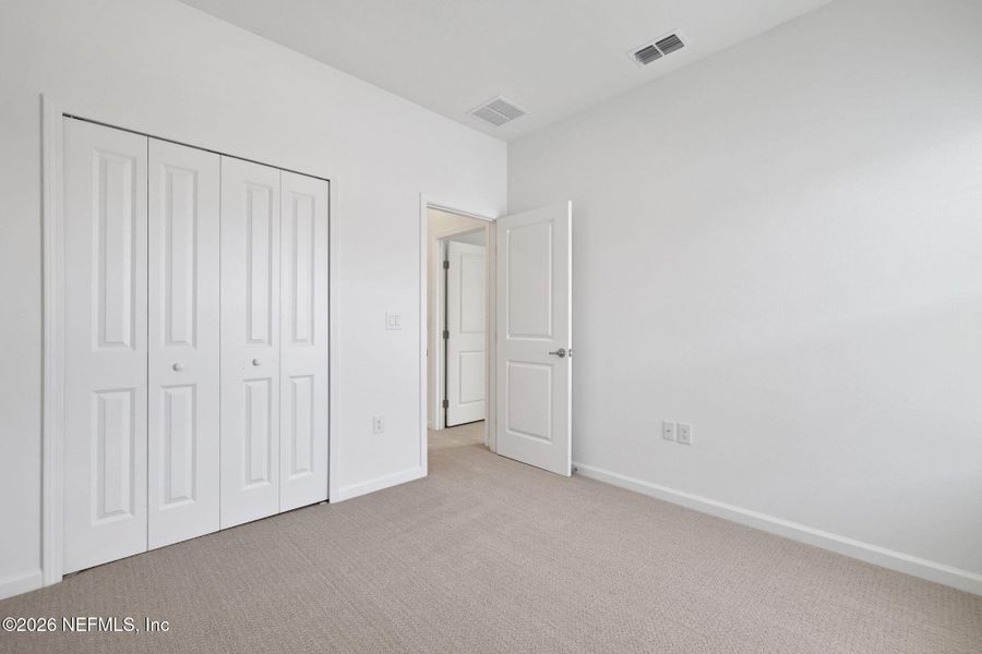 Spacious, unfurnished interior of a new home in TrailMark, St. Augustine (Image 26).