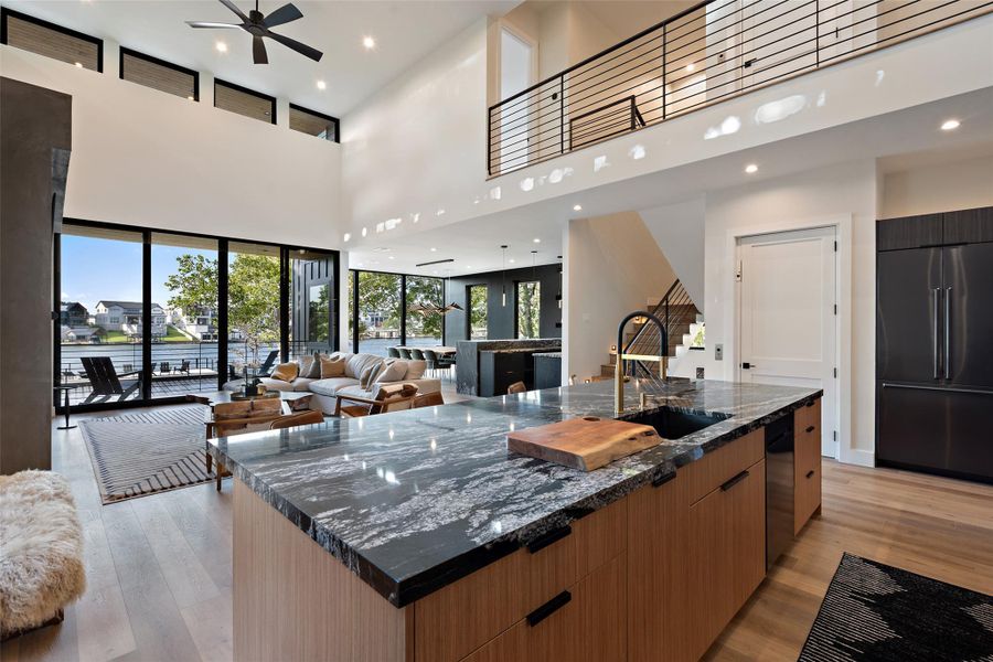 Black forest granite countertops & walls of glass.