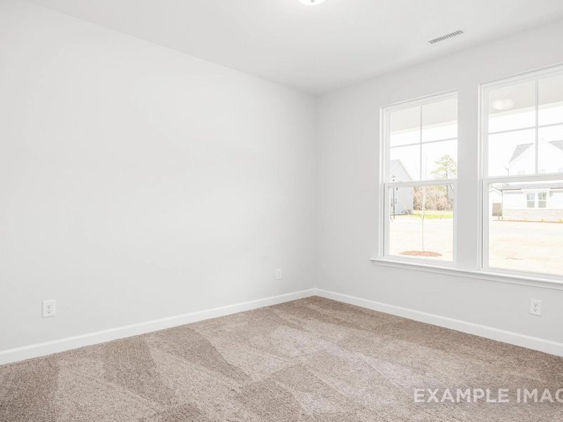 Spacious, unfurnished interior of a new home in Retreat at North Main, Lillington (Image 10).