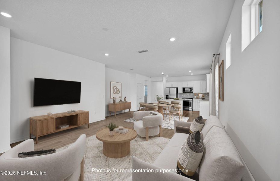 Furnished interior view inside a new home in Del Webb Wildlight, Yulee (Image 8).