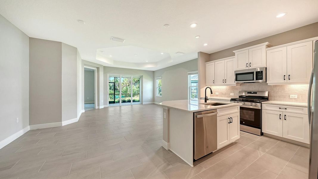 Furnished interior view inside a new home in Wildleaf Real Estate and Homes for Sale in Parrish, FL - Neal Communities, Parrish (Image 6).