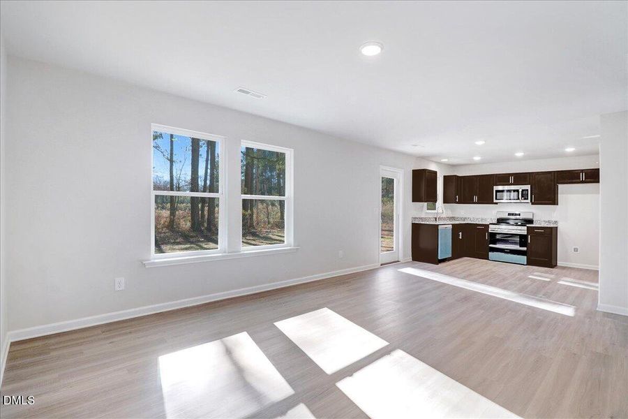 06-Living room with rear windows bringin