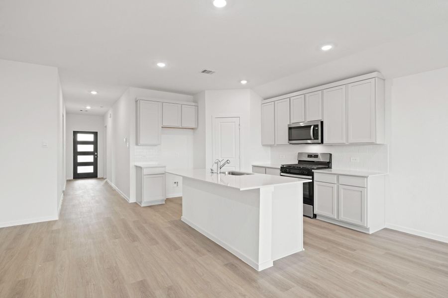 Furnished interior view inside a new home in Sunterra Lakes, Brookshire (Image 7).