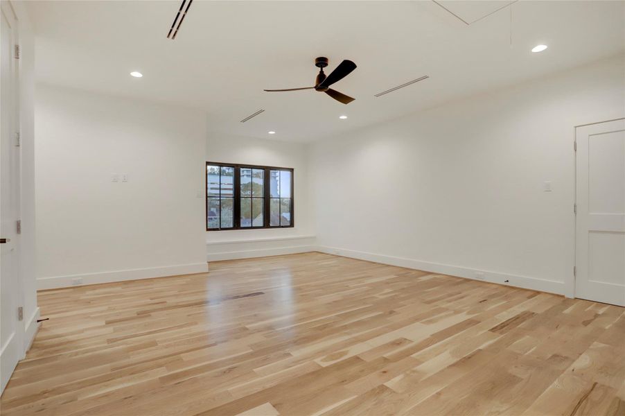 An additional and very spacious bedroom/flex room sits alone on the third floor. Also with elevator access, it could act as an in-law suite, private guest room, or hobby/work out room. This space includes a walk-in closet, attic access, and an ensuite bathroom.