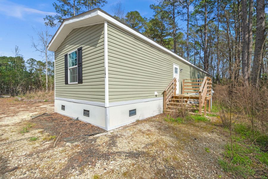 Exterior details and patio area of a home in , Summerville (Image 17).