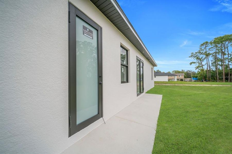 Exterior details and patio area of a home in , Lehigh Acres (Image 4).