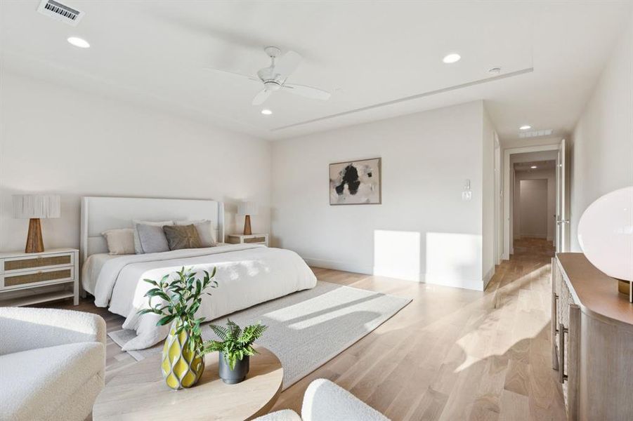 Bedroom with light wood-type flooring, recessed lighting, and a ceiling fan