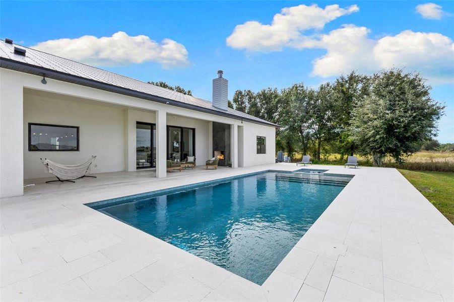Exterior details and patio area of a home in , Myakka City (Image 33).
